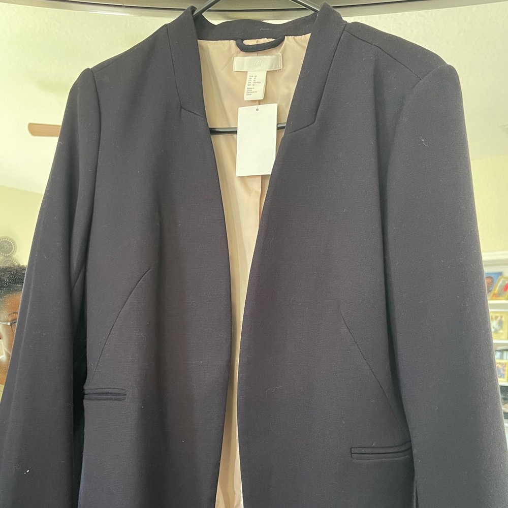 Ladies sophisticated, powerful and elegant navy blue blazer.